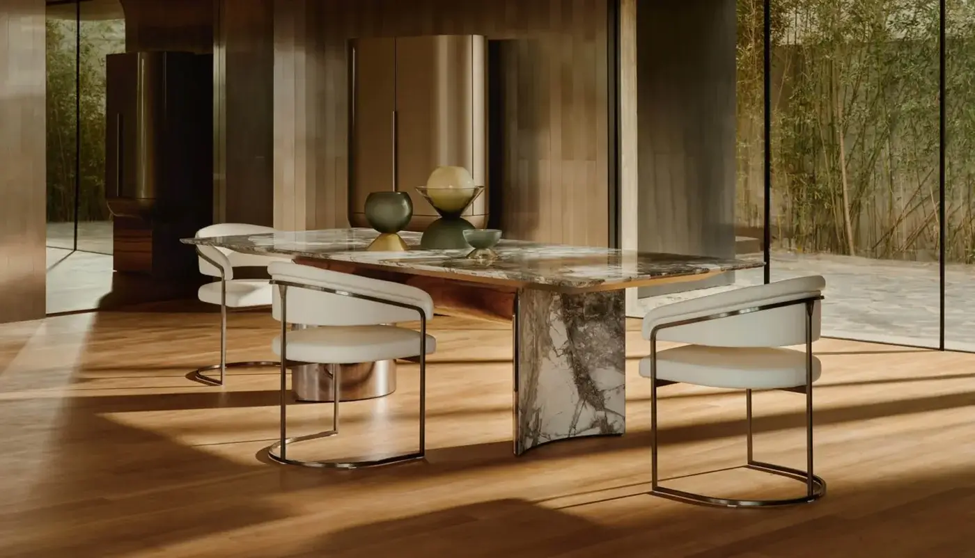 Exceptional Visionnaire Kerwan table with polished grey marble and curved stainless steel supporting sculpted legs