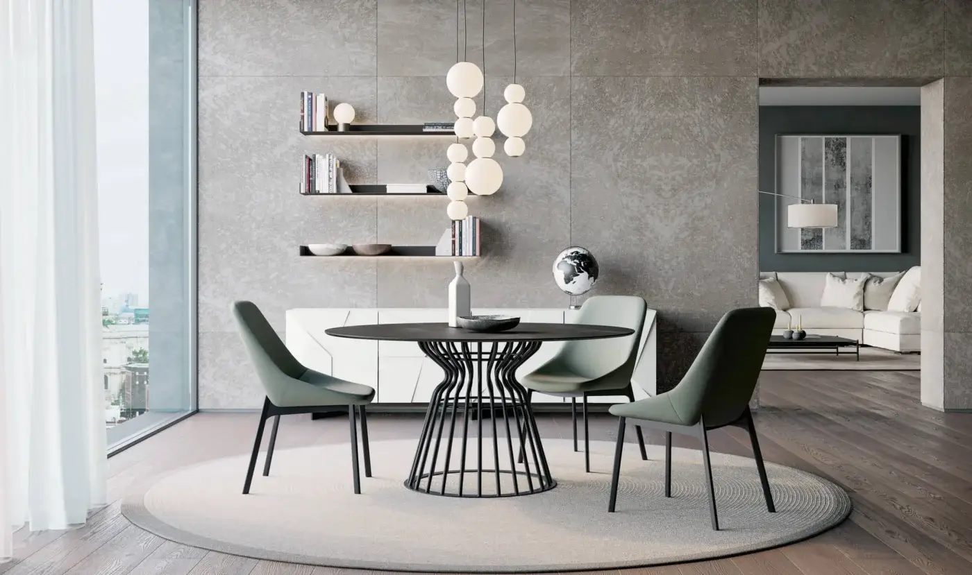 Superior Dallagnese Bomber table with sculptural metal base and smooth, matte dark-toned round tabletop