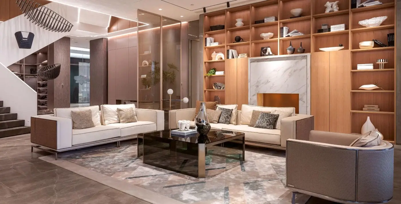 Superior Visionnaire Backstage sofa with light beige textile upholstery, satin steel frame and braided leather armrests