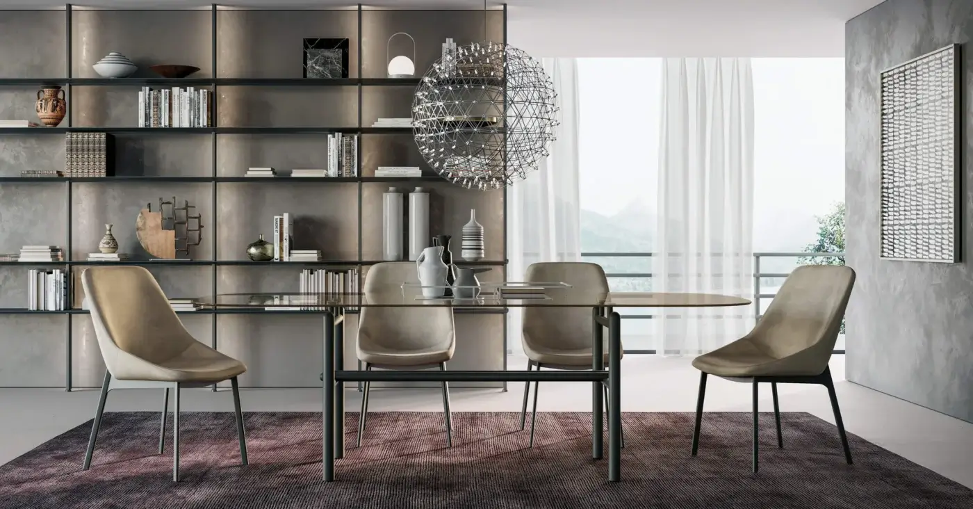 Superior Dallagnese Supernova table with gently rounded glass top and disciplined dark-toned metal tube base crafted in Italy