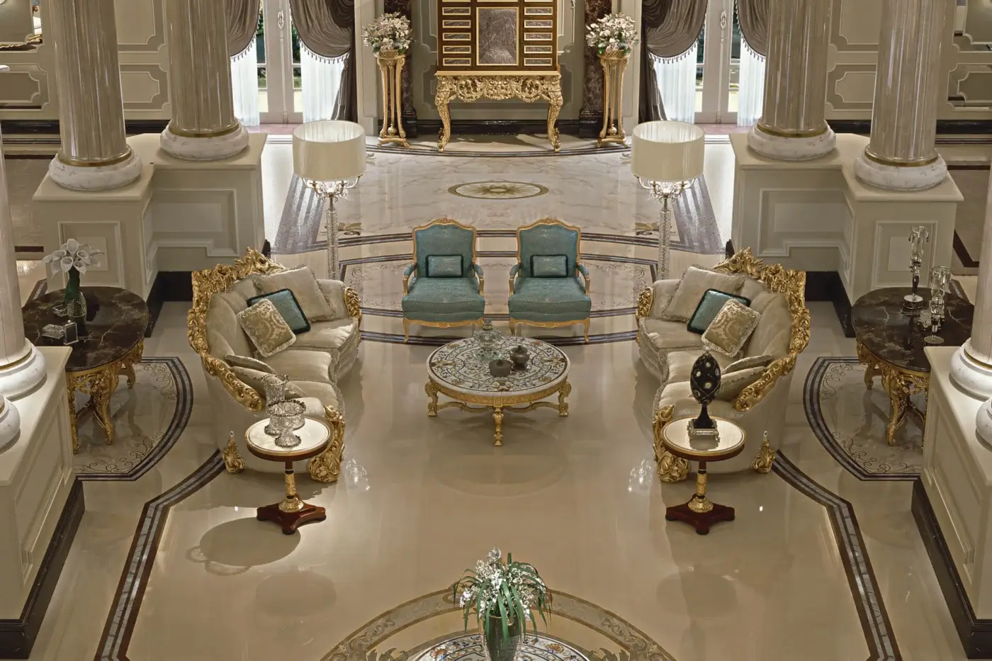 Lavish Zanaboni Leonardo sofa with sinuous curves, teal-blue upholstery and gold leaf with ivory patina finish