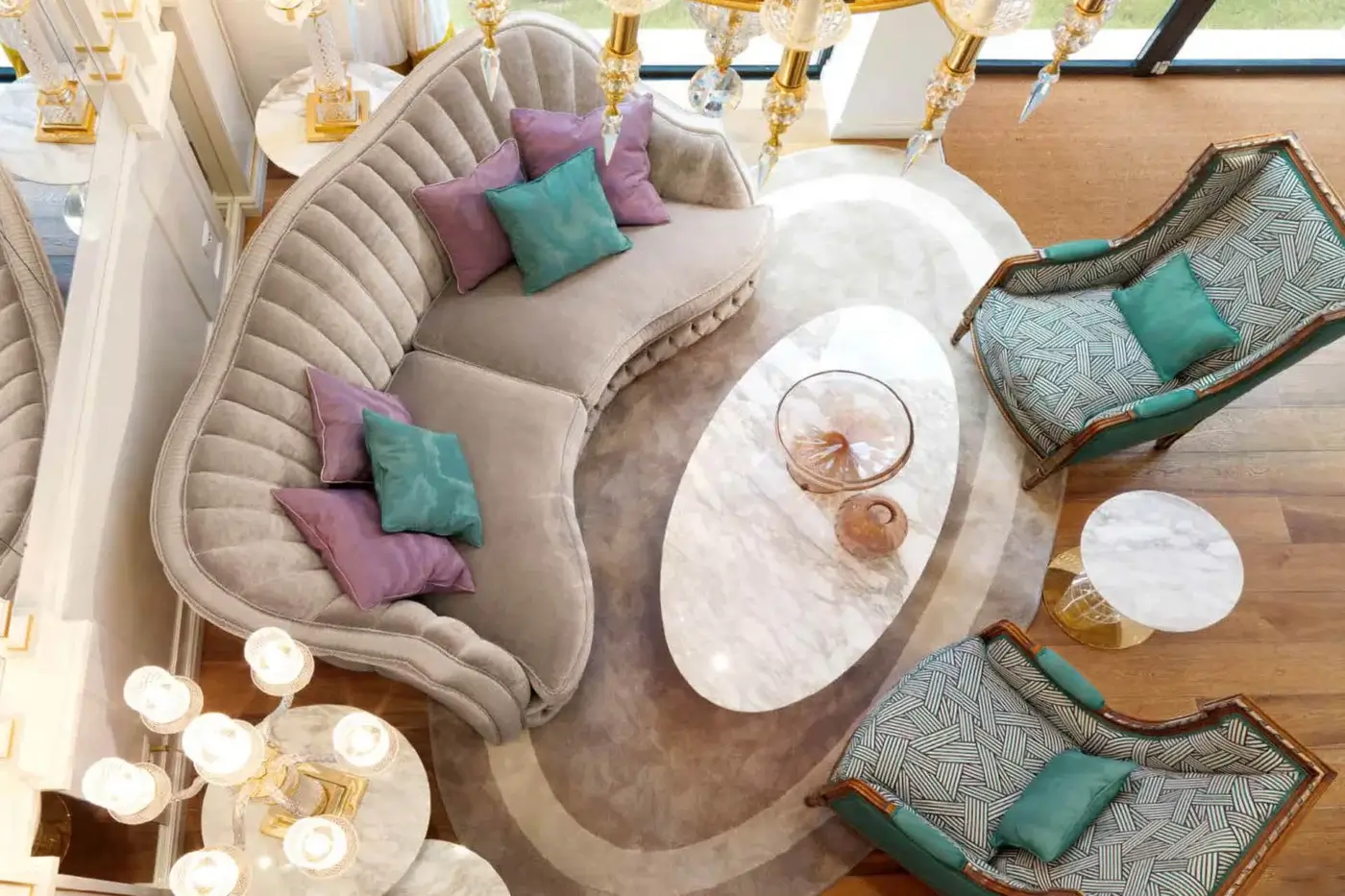 Elegant Zanaboni Smeraldo sofa upholstered in subtly textured beige fabric with lavender and teal cushions offering quilted detailing