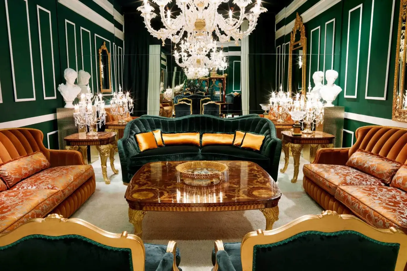 Distinguished Zanaboni Smeraldo sofa built in textured emerald green fabric with patterned orange, gold, and brown cushions and glossy legs