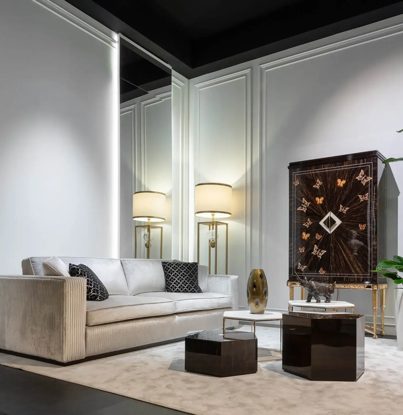 Distinguished Zanaboni Brera sofa crafted in light neutral textile with embroidered vertical bands and semi-gloss ebony finished wooden base