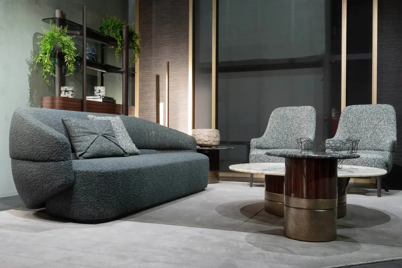 Sophisticated Zanaboni Alma sofa upholstered in muted gray-blue textile with a refined grey stained ash wood base
