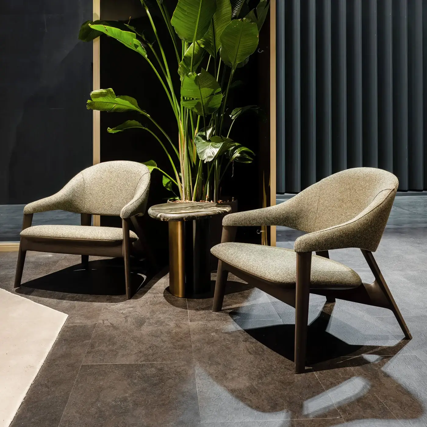 Exceptional Zanaboni Egle lounge chair crafted with neutral beige leather upholstery and satin dark brown wood frame