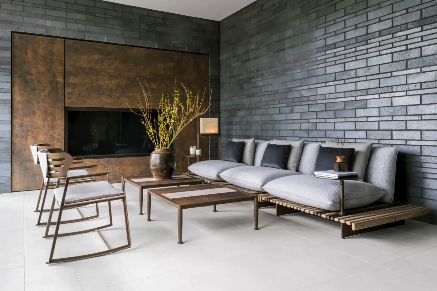 Exceptional Giorgetti Gea rocking lounge chair with geometric carob finished stainless steel and contoured dark gray birch seat
