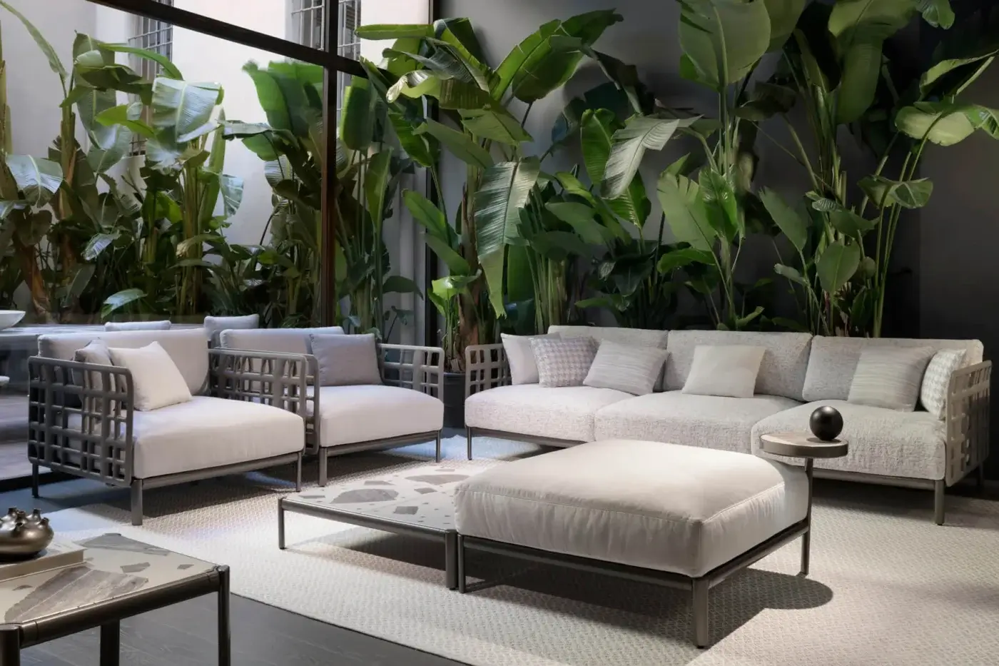 Superior Giorgetti Aldìa sofa with a pewter finished metal frame and light gray woven fabric upholstery