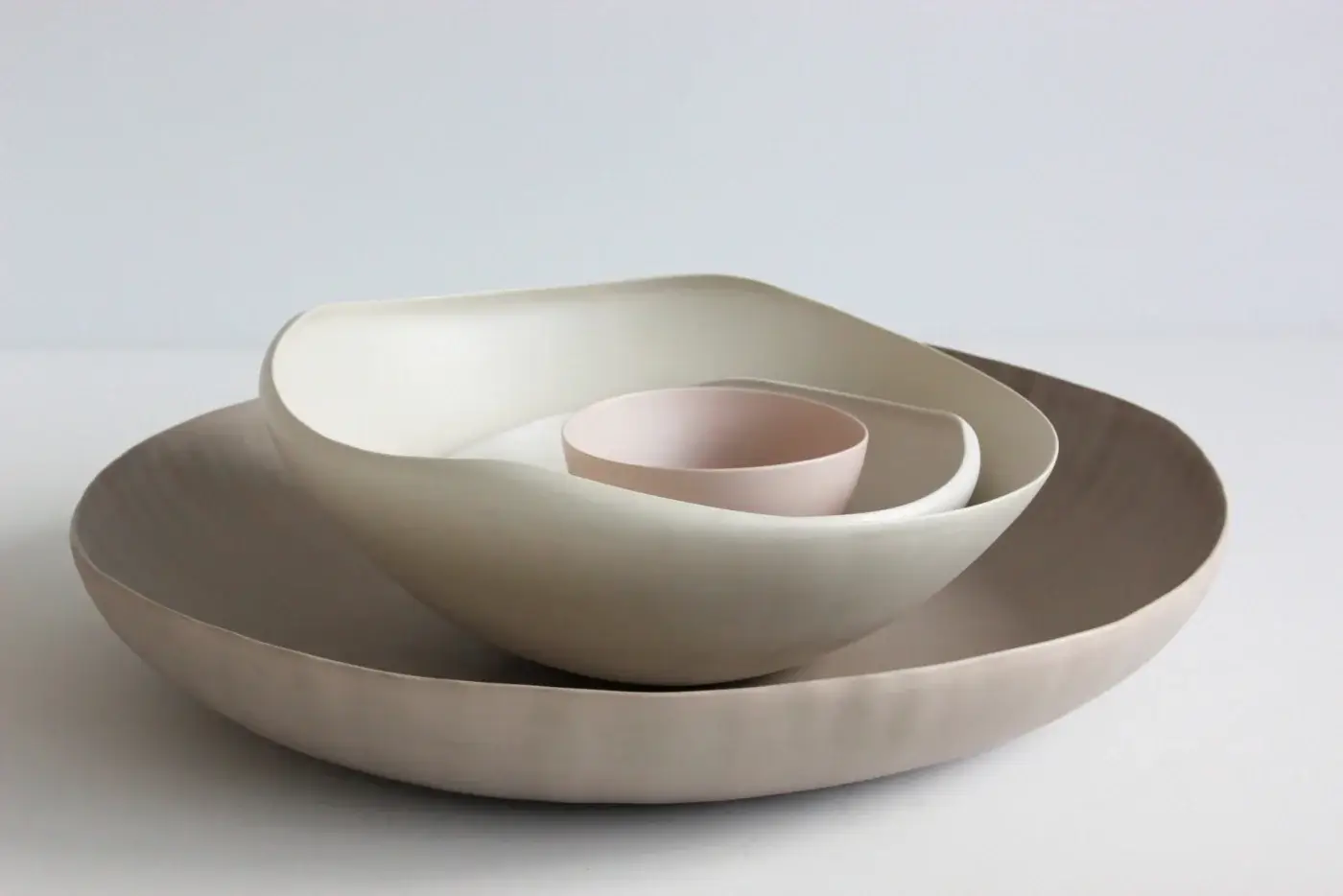 Superior Rina Menardi Fiori centerpiece crafted in baked clay with blush pink to warm grey-brown gradients for decorative display