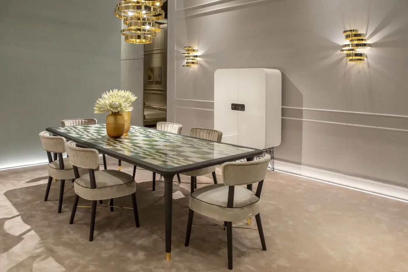 Elegant Black Tie Caius table with geometric glass tabletop and matte black metal frame with gold accents