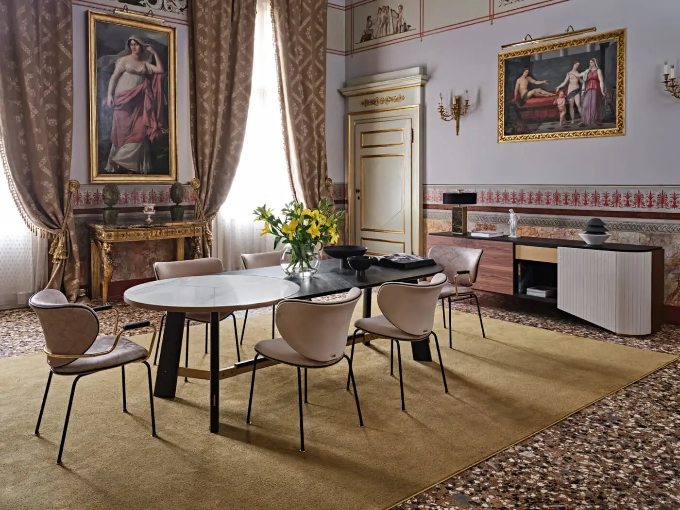 Distinguished Black Tie Opera table with dark-toned wood and angular metal, exhibiting a satin finish and organic oval silhouette