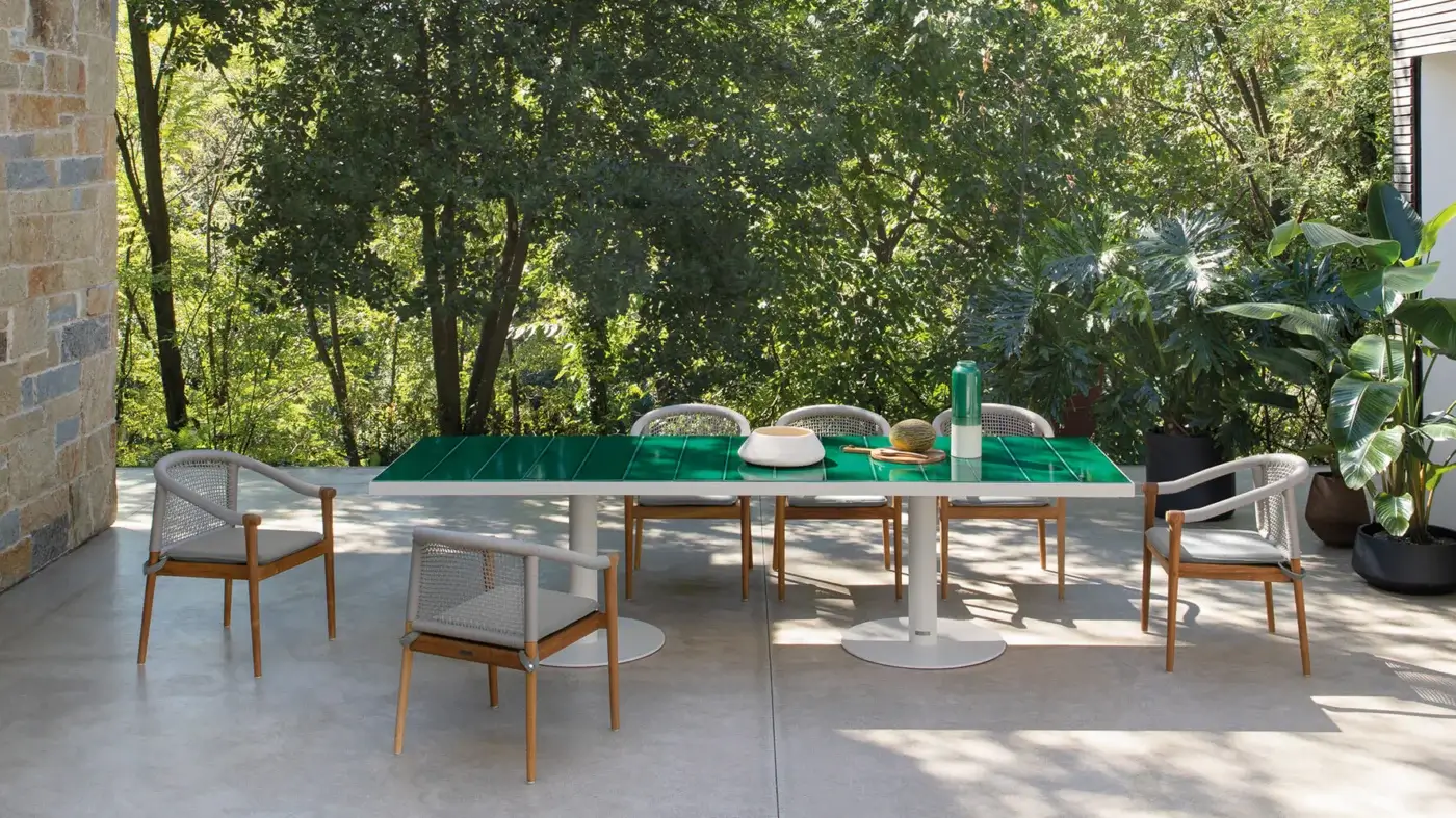 Elegant Atmosphera Pantagruel table with a vibrant green glazed ceramic tabletop and sleek white solid aluminum base