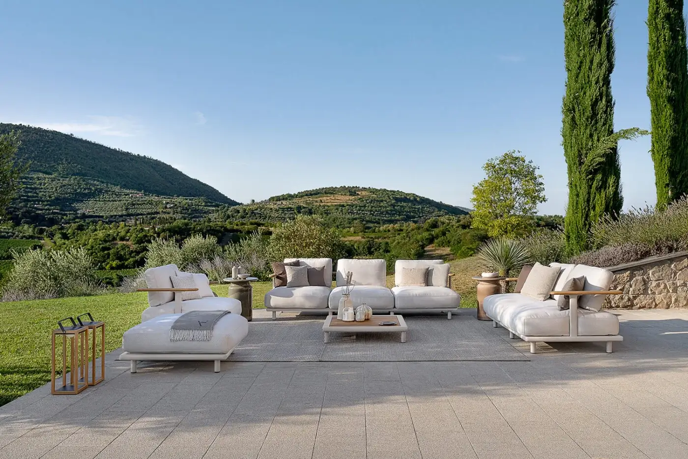 Exceptional Atmosphera Bliss lounge chair crafted with aluminum in Gesso finish and natural teak armrests with off-white textile upholstery