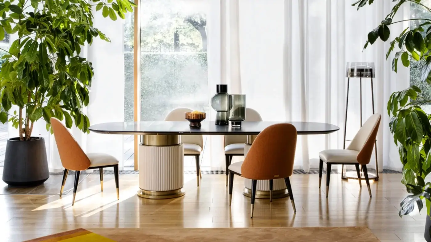 Distinguished Capital Rock table with shaped marble top and cylindrical leather-upholstered bases in a plain finish