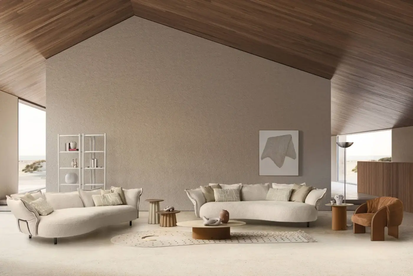 Luxury Nuvola sofa upholstered in cream‑tinted textured textile with dark metal legs and a refined metal armrest plate