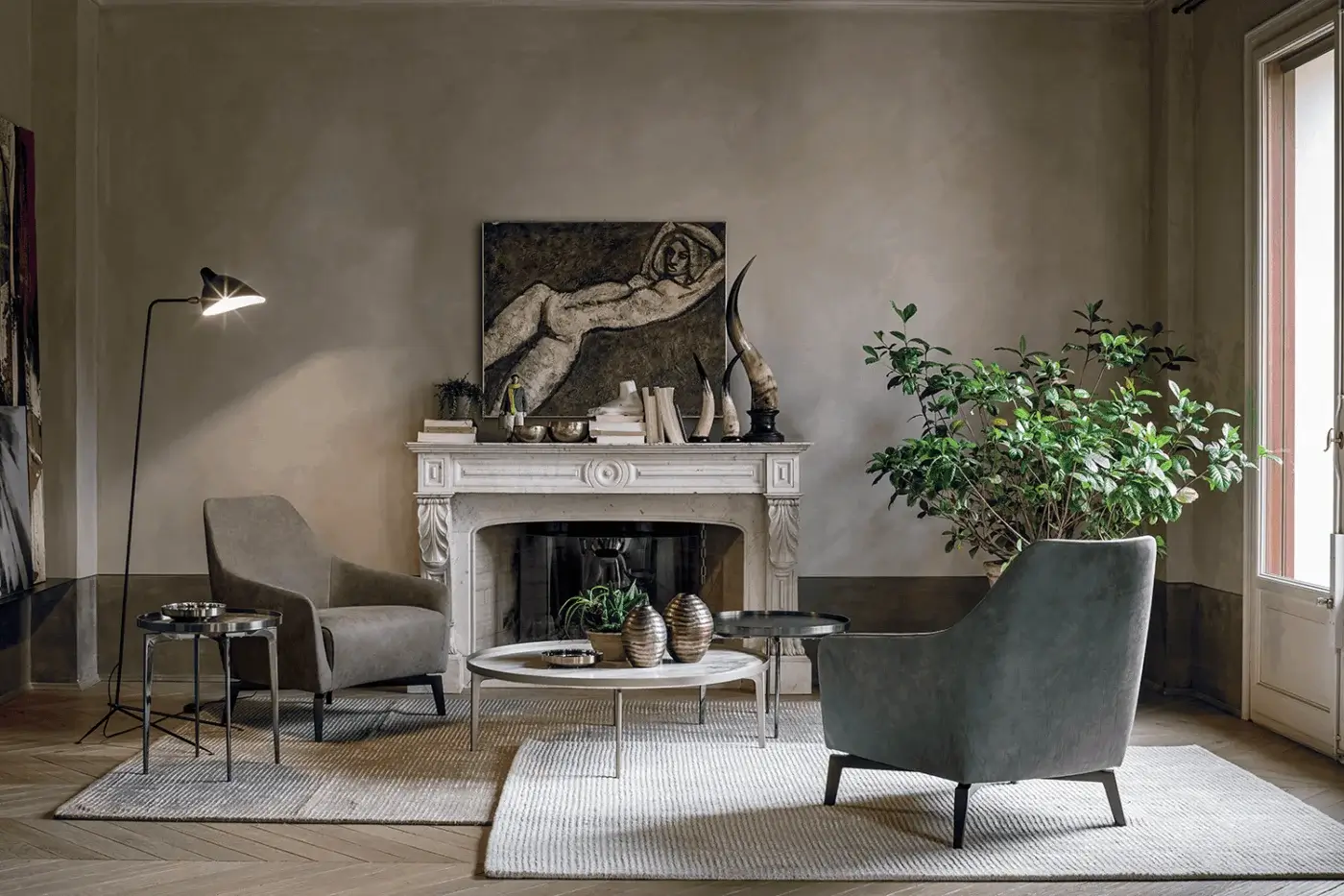 Elite Alivar Sirio Side & Coffee Table with low oval off‑white matte surface and slender silver metal legs