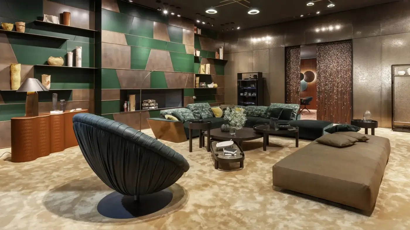 Luxury Laurameroni Metropol sectional in forest-green velvet, bronze panel, lacquered wooden frame, black base