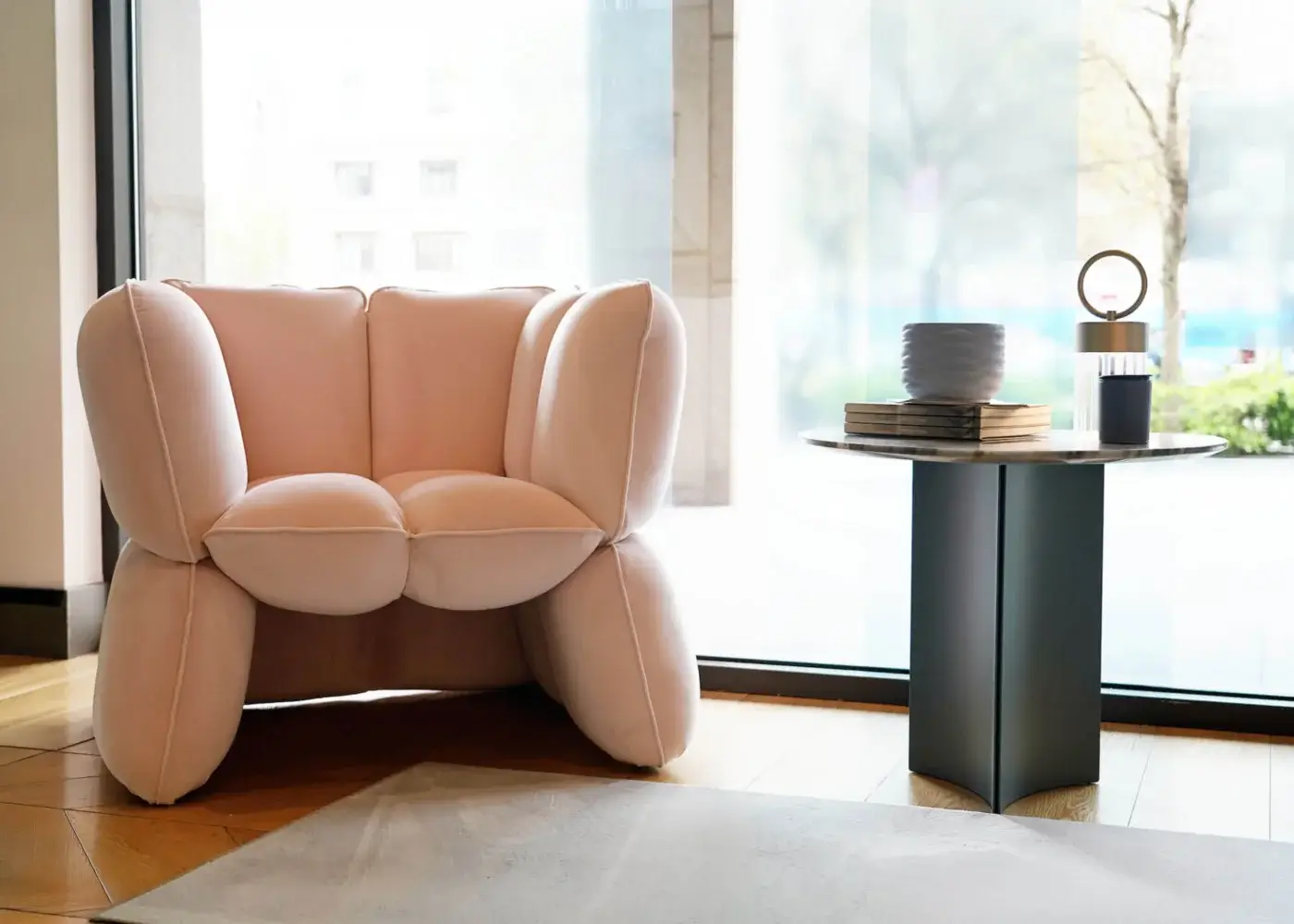 Exquisite Furla Casa Fiore lounge chair in soft pale pink textile with organic bulbous silhouette and metal frame