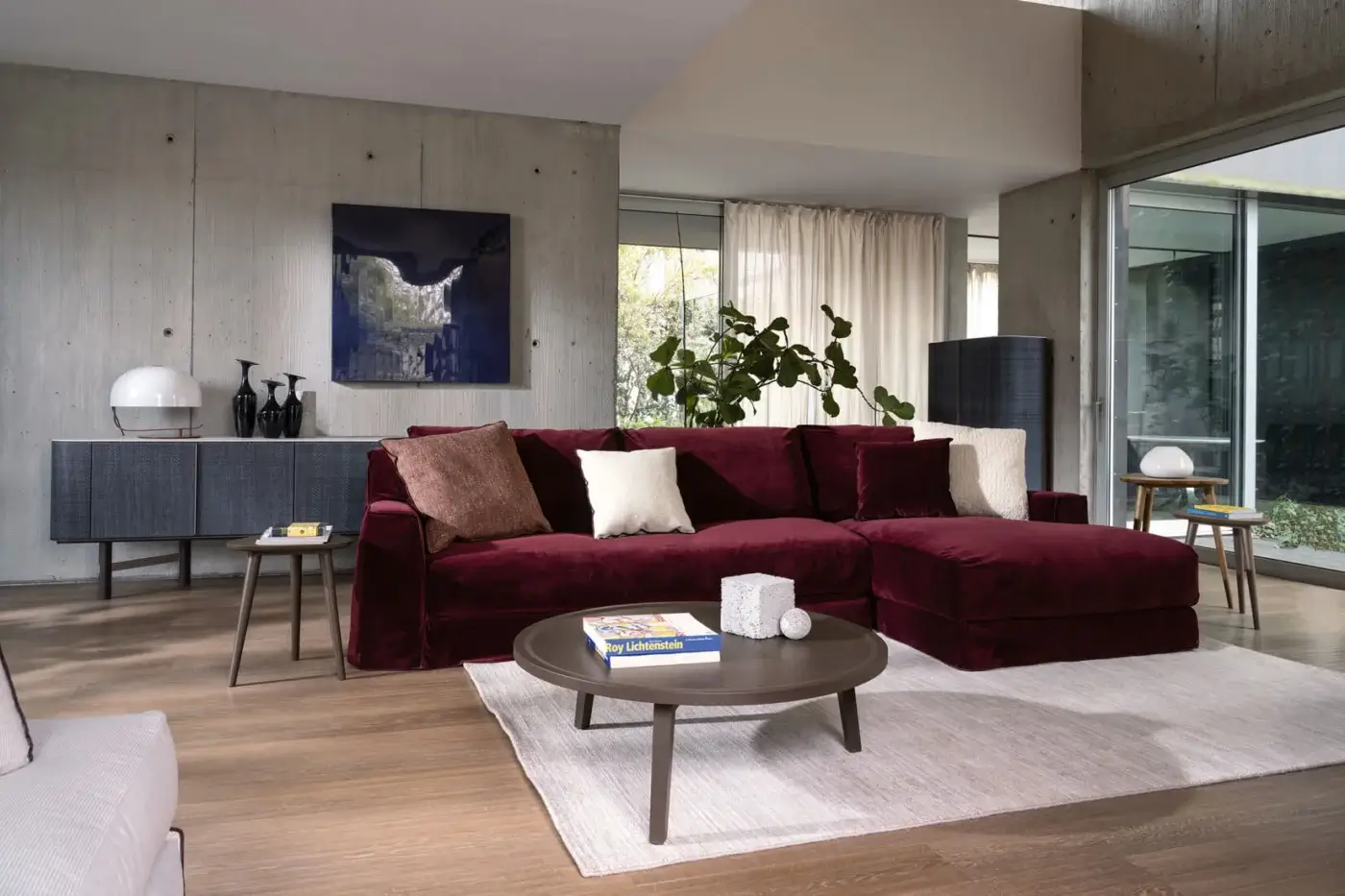 Exquisite Gervasoni Gray 49-46 coffee table in muted matte dark solid ash wood with a refined circular tray-like profile