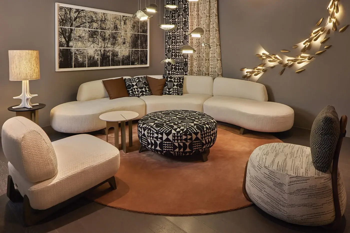 Elegant Paolo Castelli Anodine wall lamp crafted from metal in a sophisticated satin gold organic leaf inspired finish
