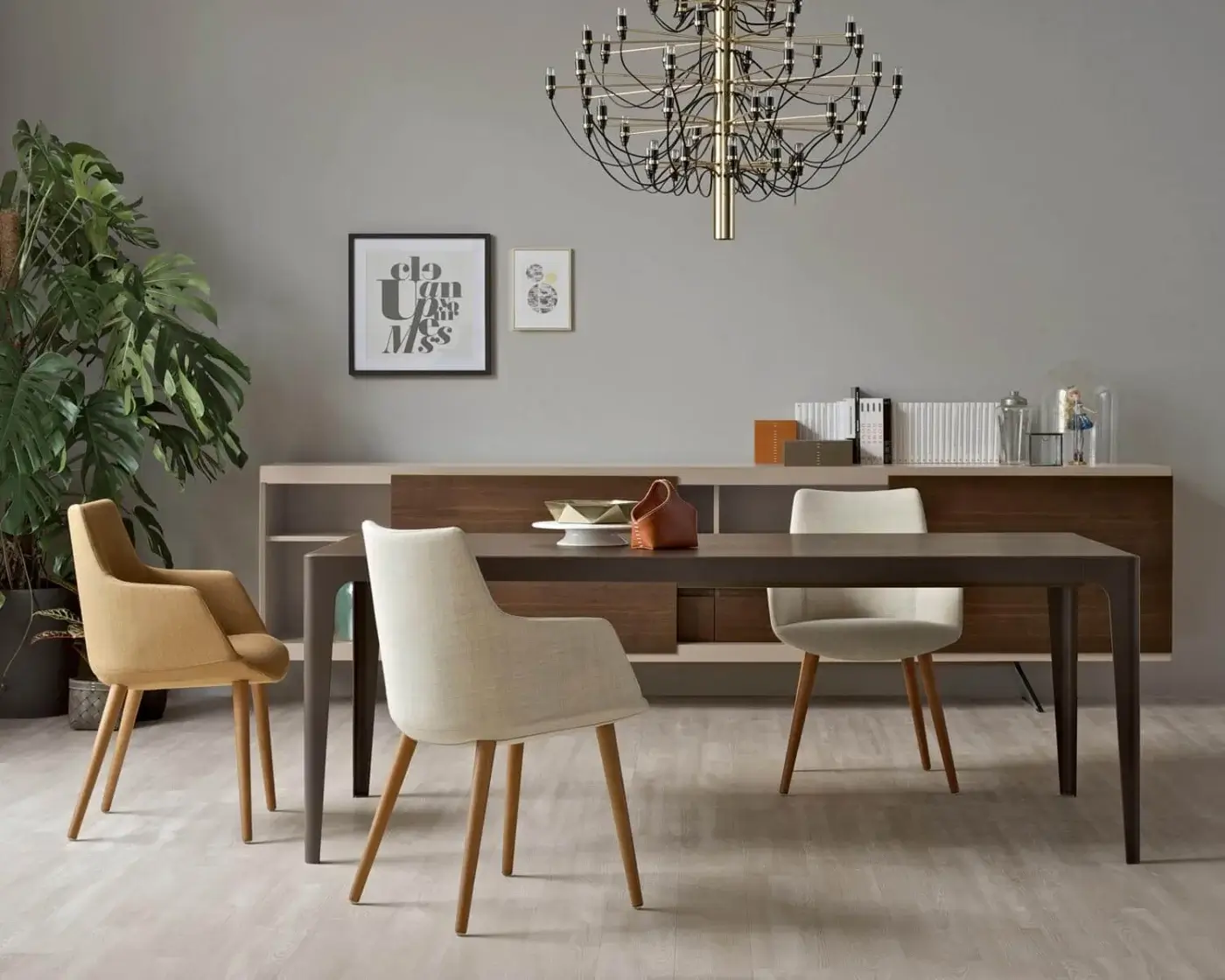Elegant Presotto Divina armchair with soft silhouette upholstered in pale yellow textile and natural ash wood legs
