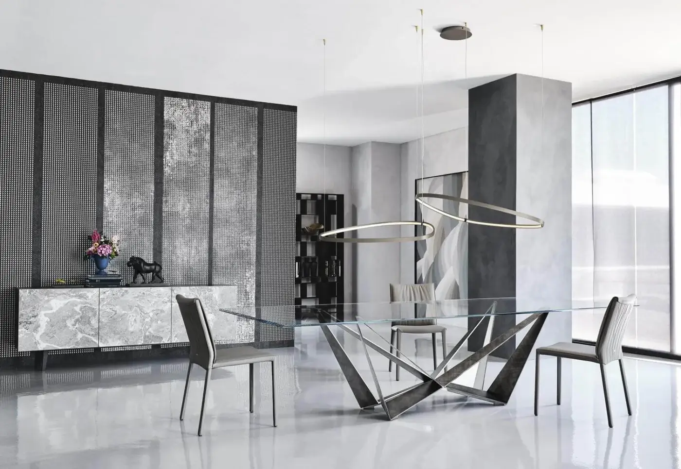Innovative Cattelan Italia Magellano suspension lamp with an asymmetrical round diffuser in titanium embossed lacquered steel