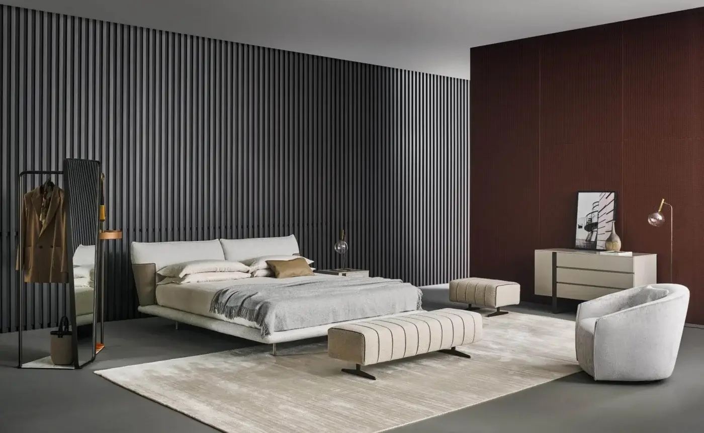 Sophisticated Bonaldo Mark bench with light beige textile upholstery accented with dark striped detailing and precious leather inserts