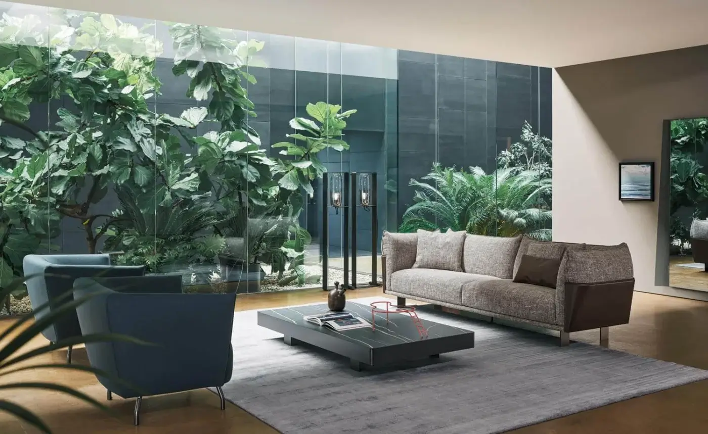 Elegant Bonaldo Blend sofa with light gray textured fabric and dark brown emery leather detailing in sleek matt painted metal