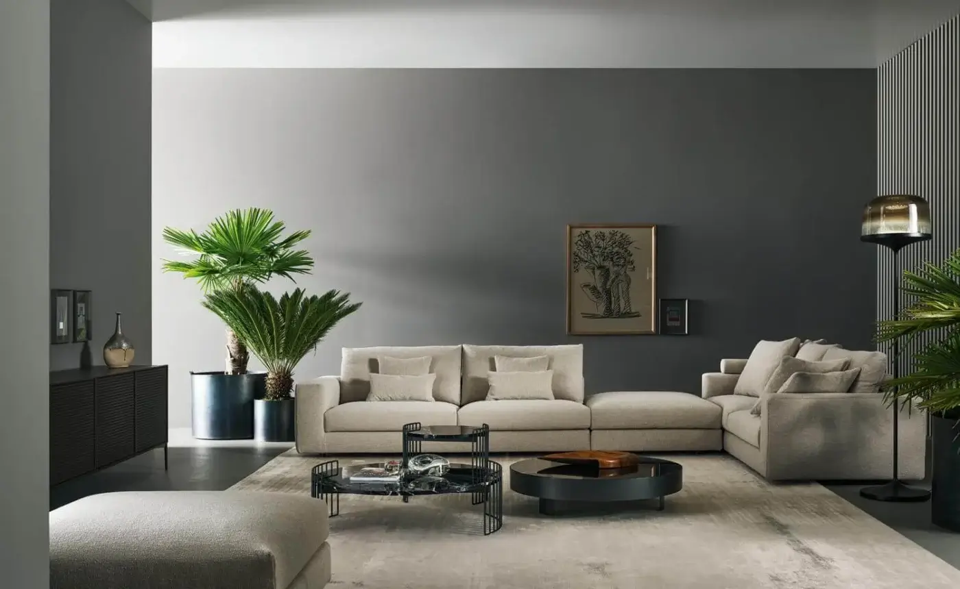 Elegant Bonaldo Superhiro sectional with light beige textile upholstery and matt black painted metal cylindrical feet