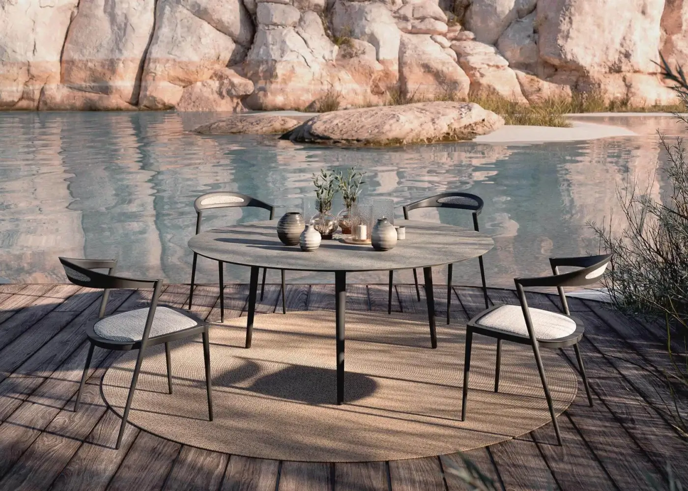 Distinguished Royal Botania Styletto chair with compelling curves and a dark matte aluminum frame paired with light textile cushioning