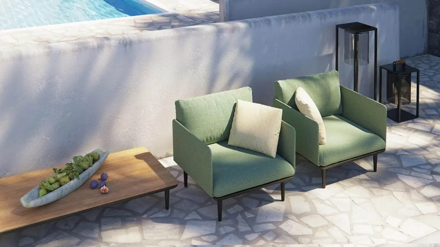 Elegant Royal Botania Styletto lounge chair in light green matte fabric with dark coated aluminum legs and beige cushion