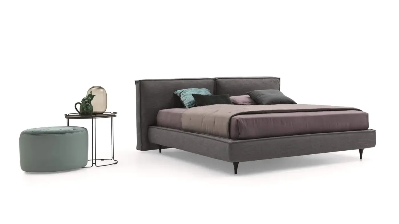 Distinguished Ditre Italia Flann bed with pinewood frame swathed in matte gray textile and short tapered legs