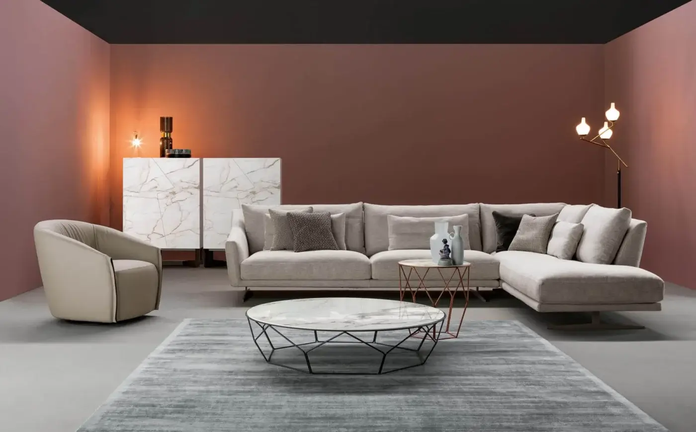 Superior Bonaldo Skid sectional upholstered in light neutral textile with matte finish and painted metal base