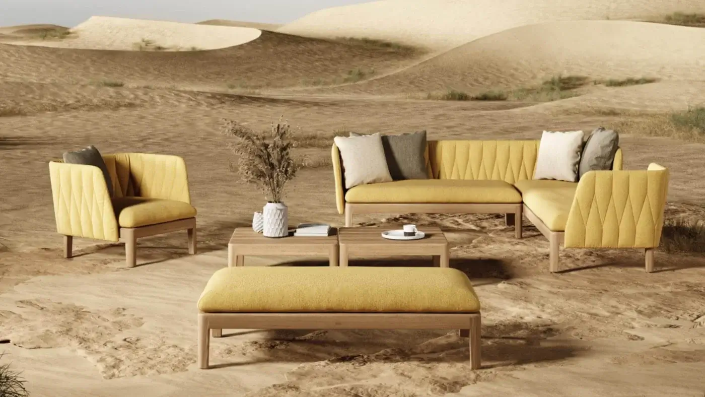 Distinguished Royal Botania Calypso lounge chair with quilted muted yellow textile and stainless steel teak base
