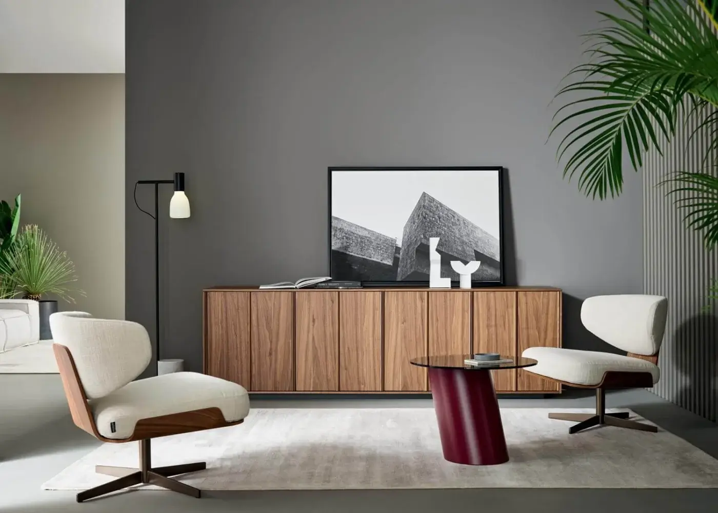 Exceptional Bonaldo Olos lounge chair with sinuous design, curved wood and dark satin metal base with textile upholstery