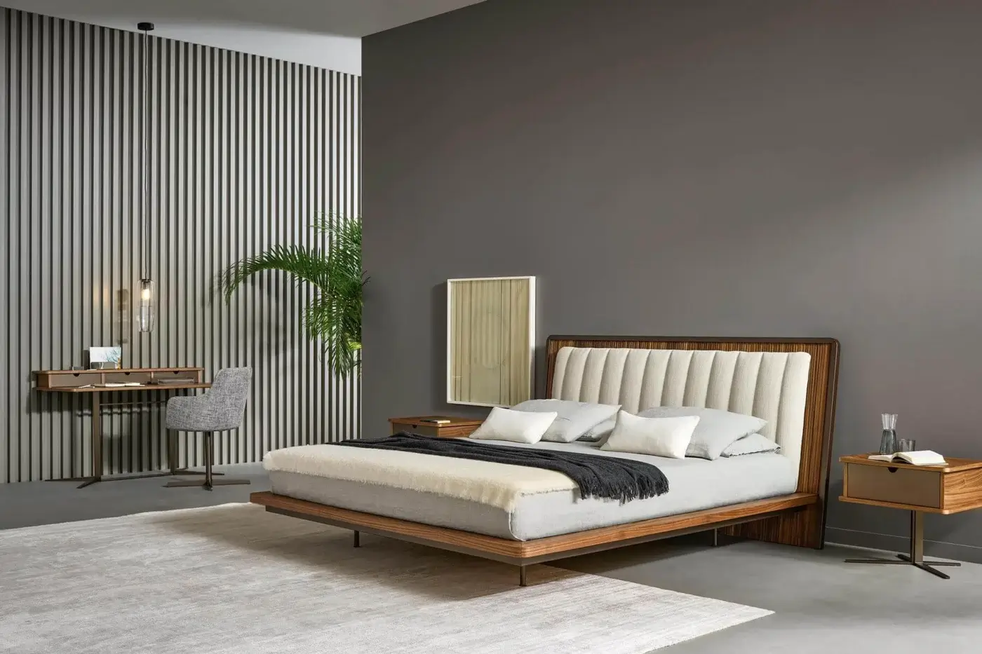 Distinguished Bonaldo Nelson bed with Canaletto walnut veneered wood and light textile upholstery, built with bronze matt painted metal feet