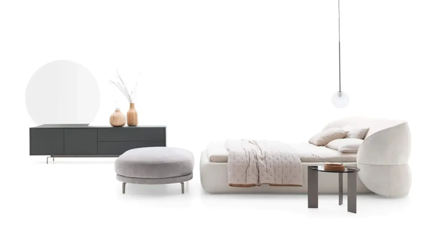 Exclusive Ditre Italia Clip bed with curved headboard and padded base upholstered in refined white fabric with textured finish