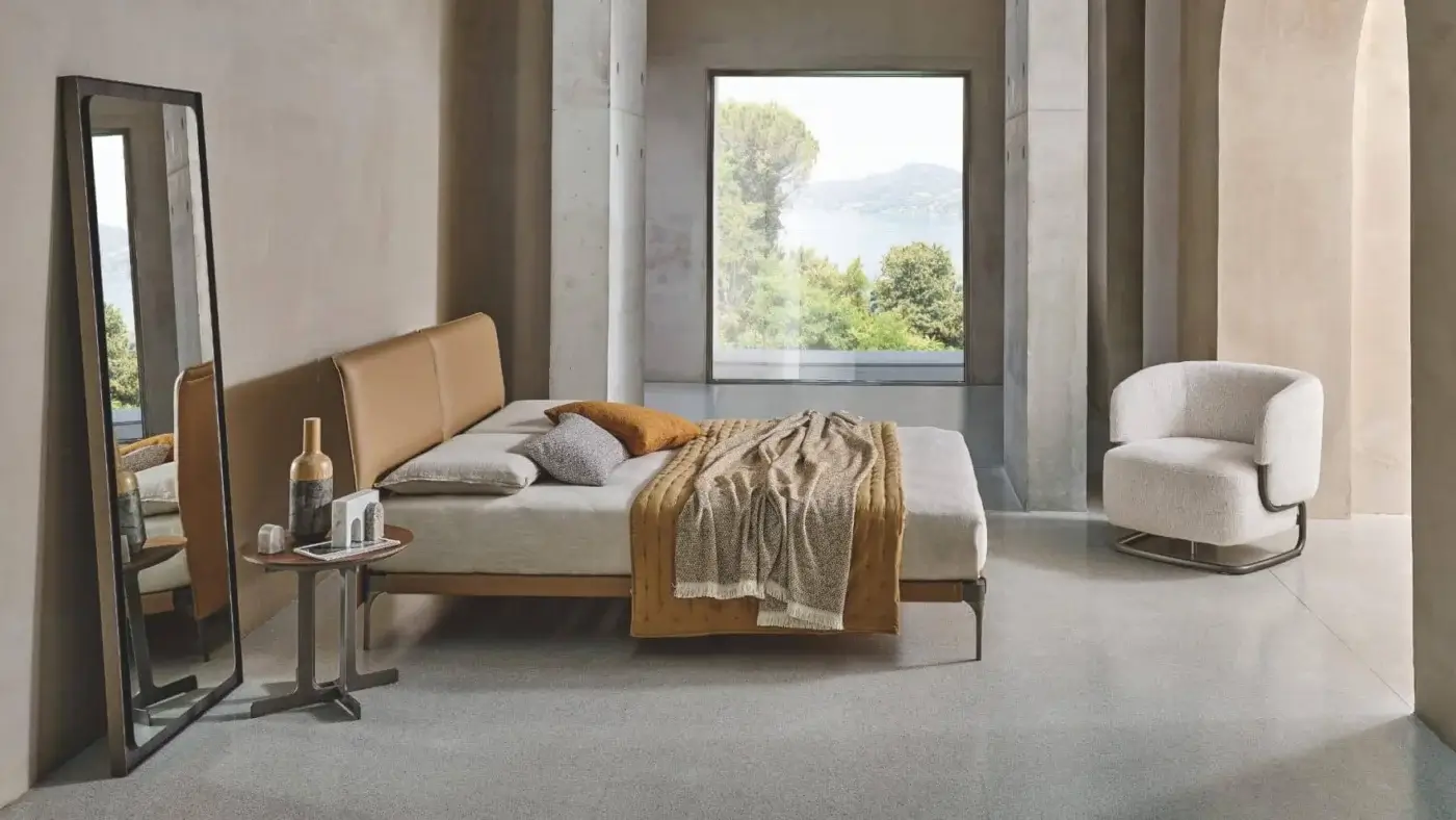 Exclusive Ditre Italia Ada bed with slimline headboard upholstered in warm tan leather and dark metal legs