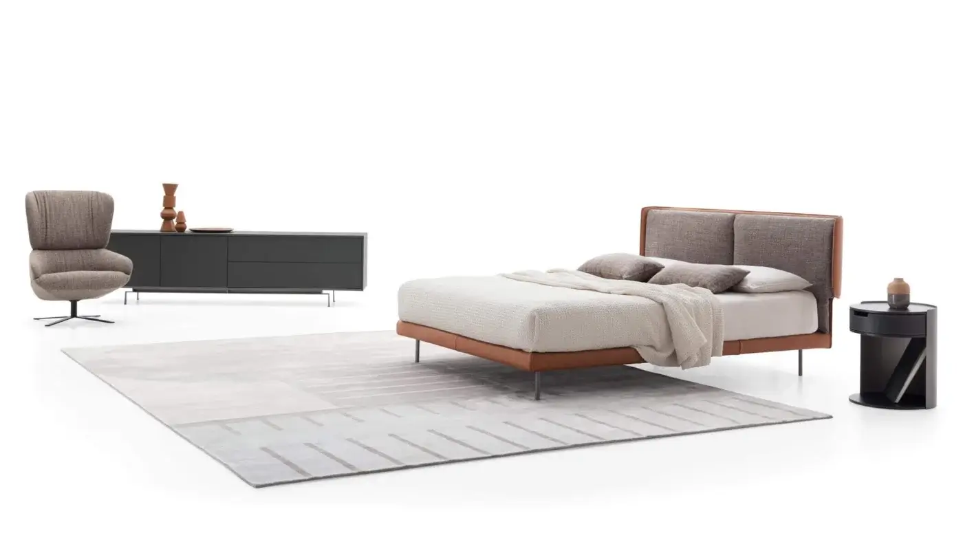Exceptional Ditre Italia Skin bed with brown leather frame and horizontally oriented gray-brown textile upholstery