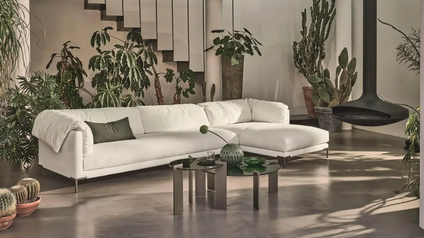 Superior Ditre Italia Aulos coffee table with a dark-tinted transparent glass top and asymmetrical varnished metal legs