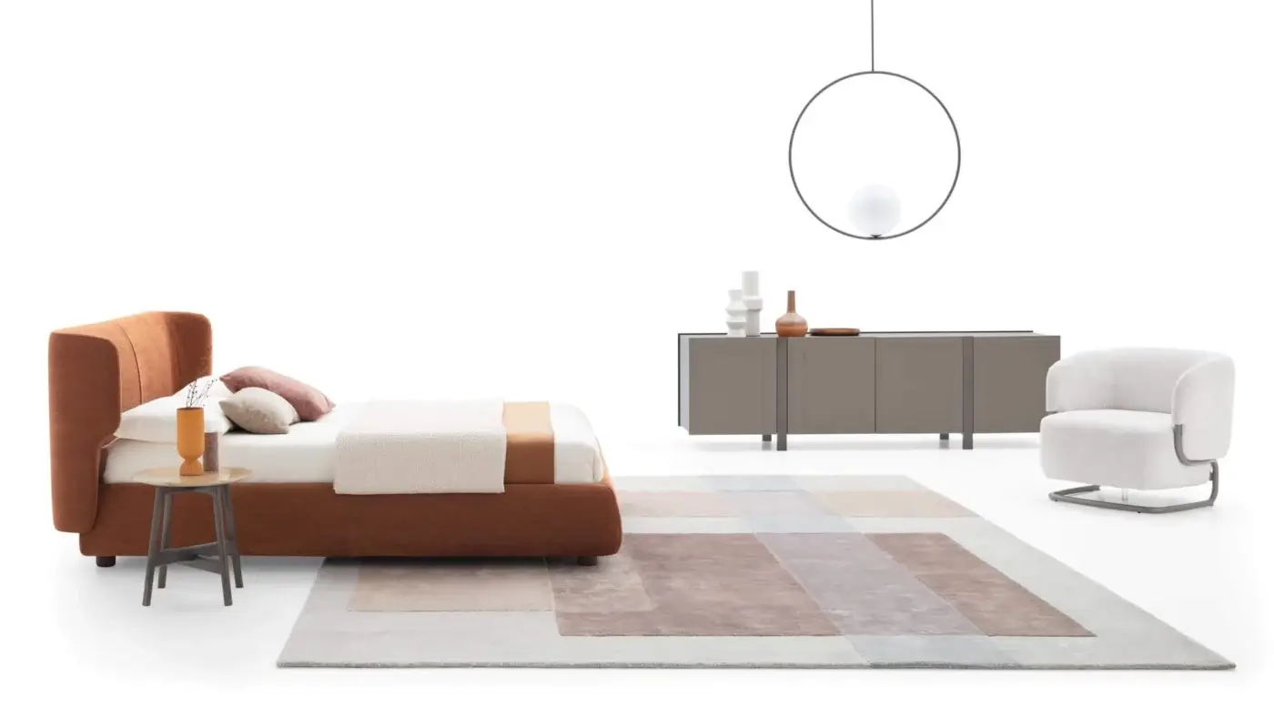 Elegant Ditre Italia Marabù lounge chair with reddish-brown upholstery and curved tubular metal frame