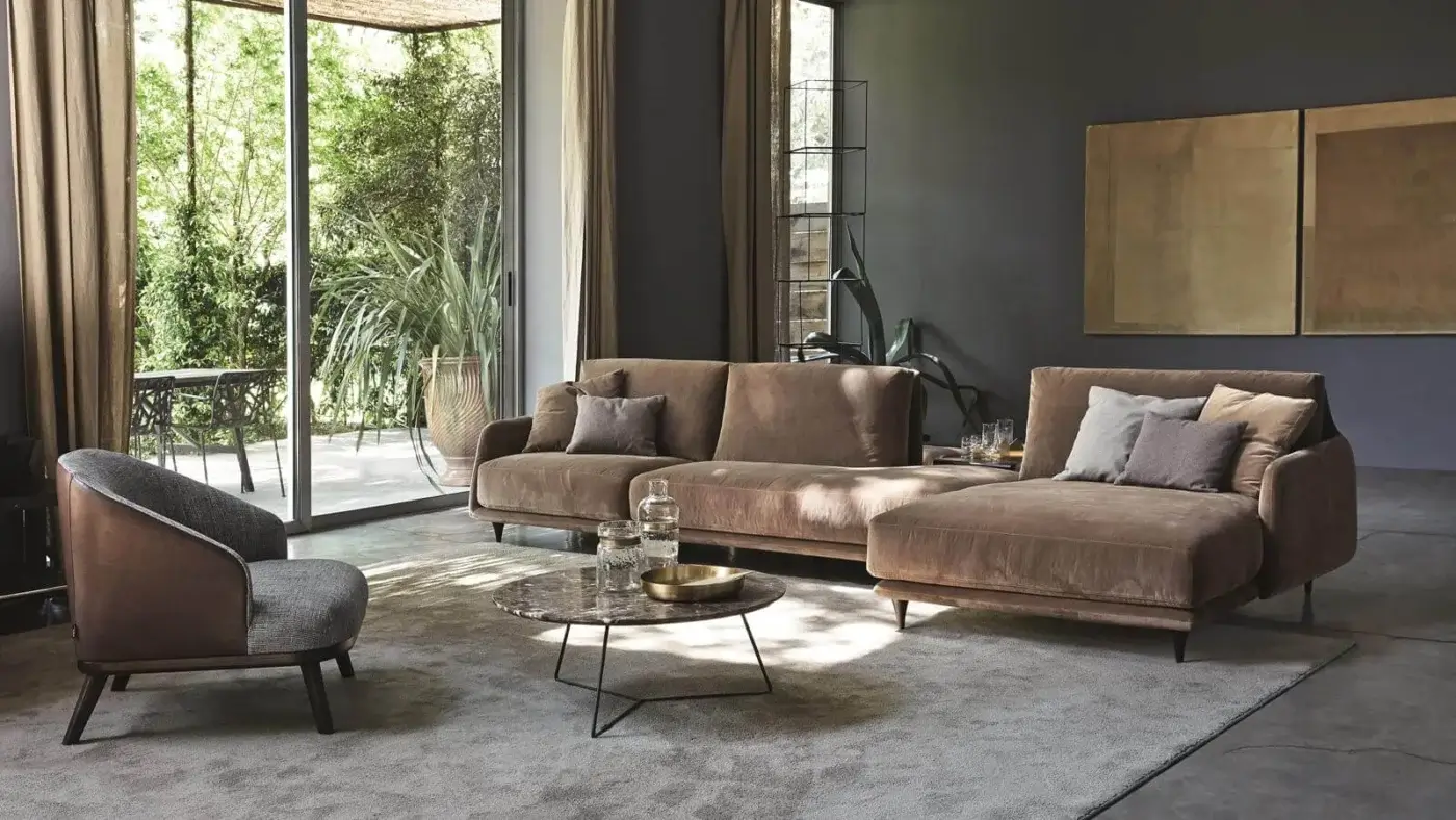 Elegant Ditre Italia Elliot sectional with soft curves upholstered in warm brown textile and matte finish