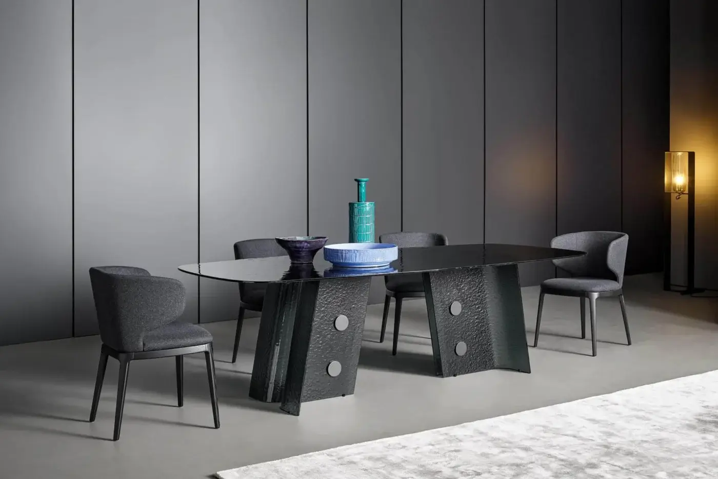 Superior Bonaldo Botón table with organically shaped smoked tempered cast glass top and textured lead plus metal base