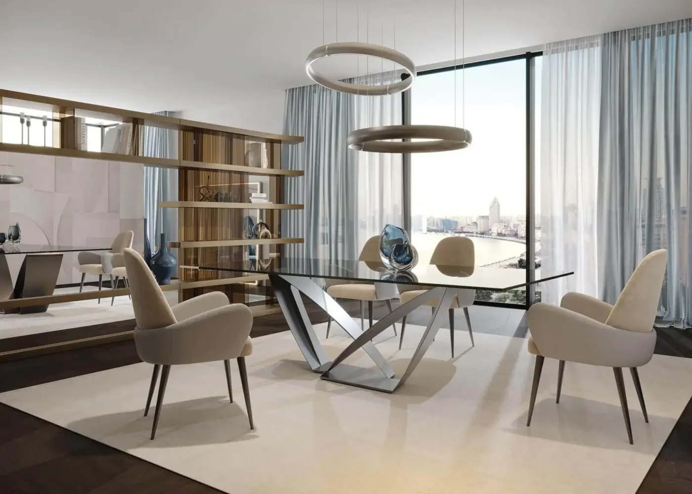 Glass dining table with silver angular base, six cream atlantic armchairs, cityscape view, wooden bookshelf, brushed metal pendant lights.