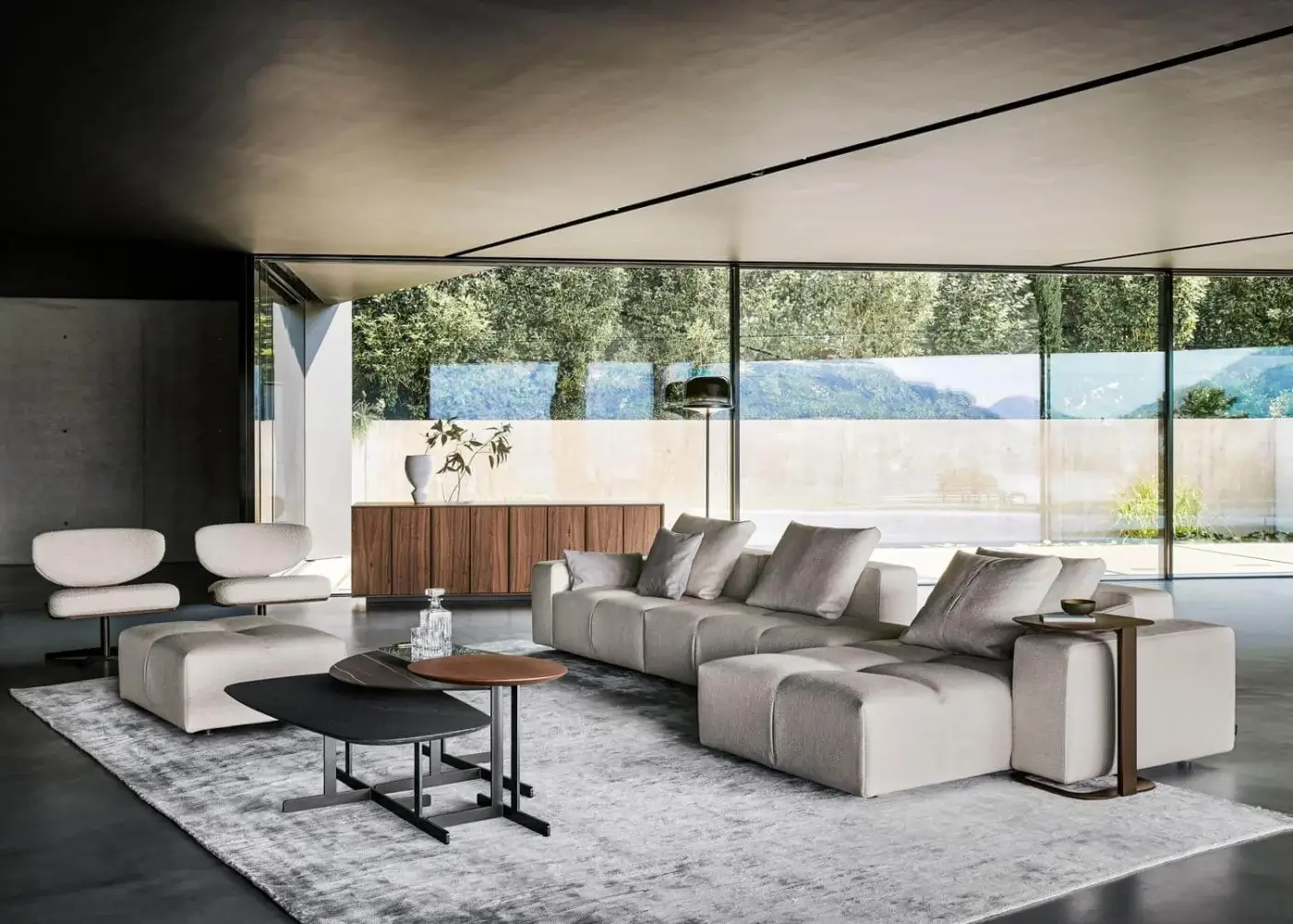 Harmonious Bonaldo Bonamour sectional with light gray textile upholstery and black matt varnished metal feet