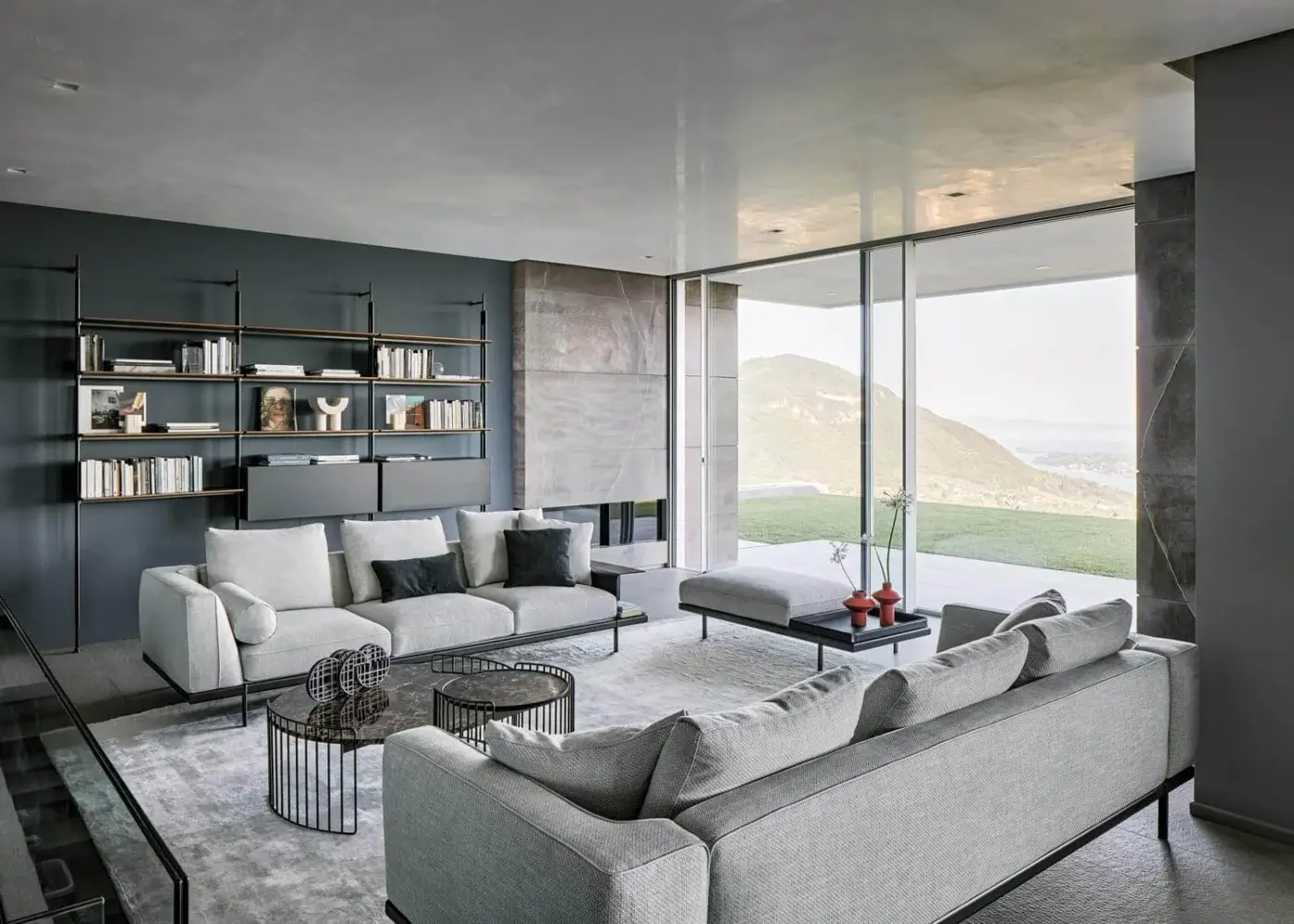 Captivating Bonaldo Phil sectional with light gray textured textile and matt varnished metal perimeter base