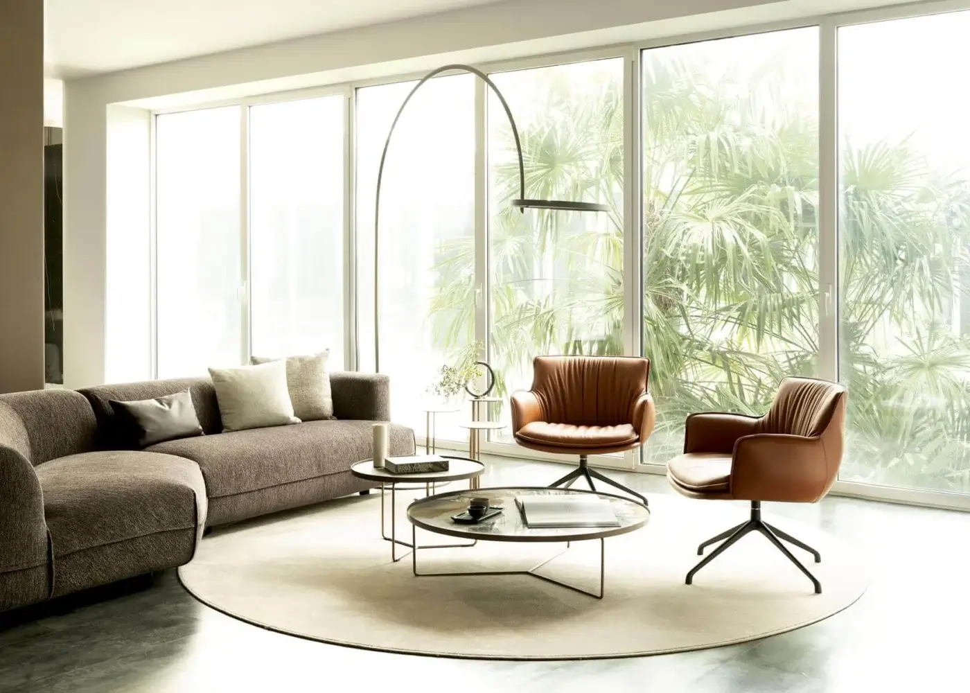 Exceptional Cattelan Italia Rhonda lounge chair with warm brown textile upholstery and black metal swivel base