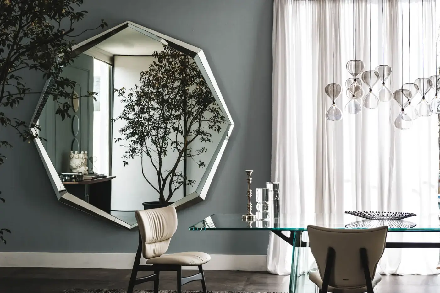 Exclusive Cattelan Italia Emerald mirror with a geometrically shaped fully mirrored frame and sleek silver finish