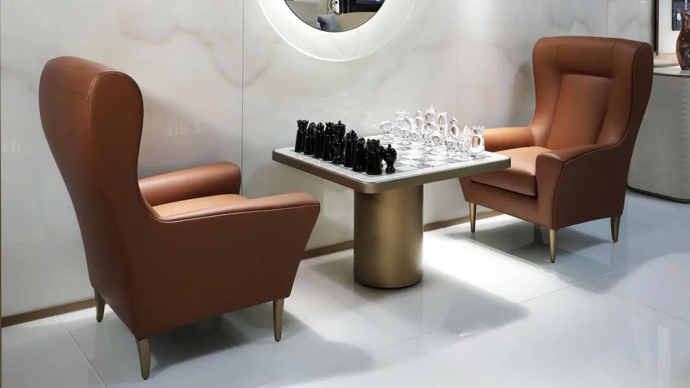Distinctive Reflex Tau Steel Scacchi table with a marble glass chessboard top and satin brass cylinder base