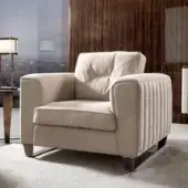 Sophisticated DV Home Collection Beverly lounge chair with light beige textile upholstery and sleek metal base
